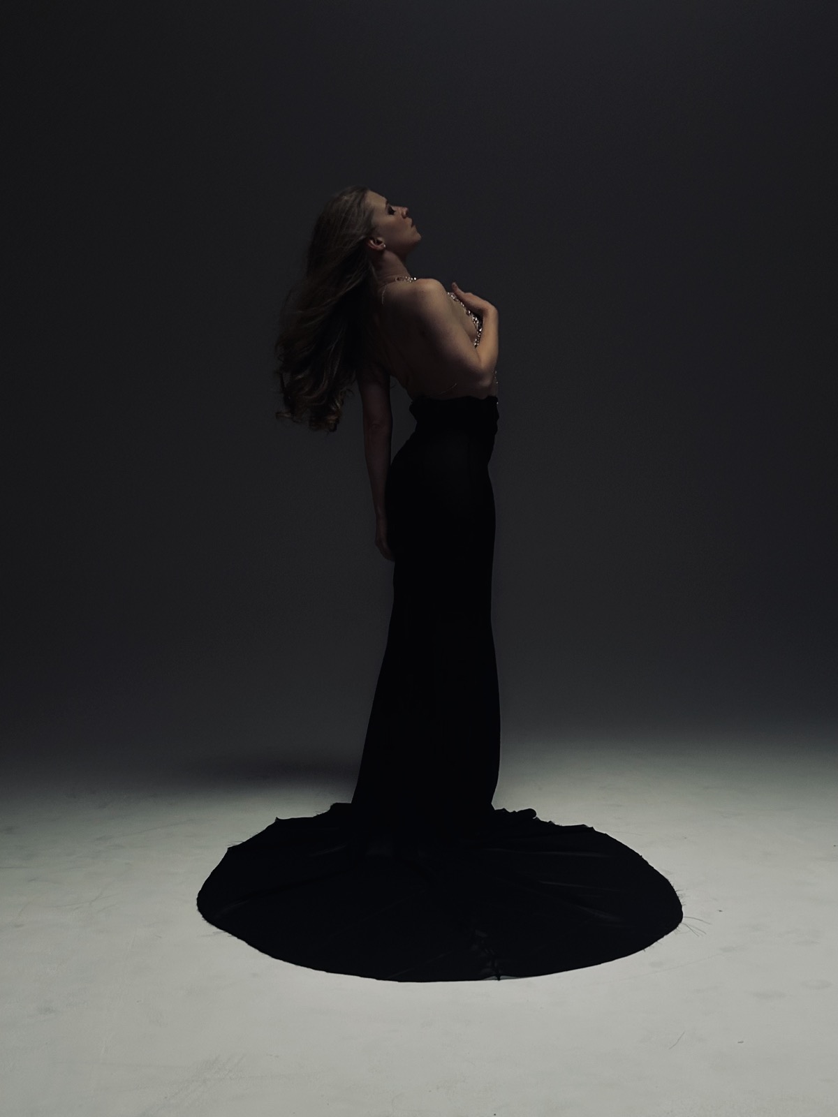 Editorial portrait in a black gown